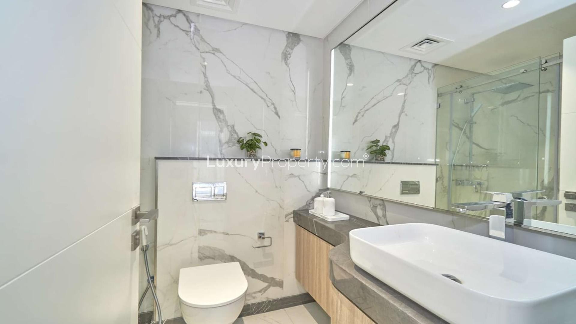 Modern bathroom in studio apartment, Pinnacle Tower, Dubai Hills Estate, marble finishes