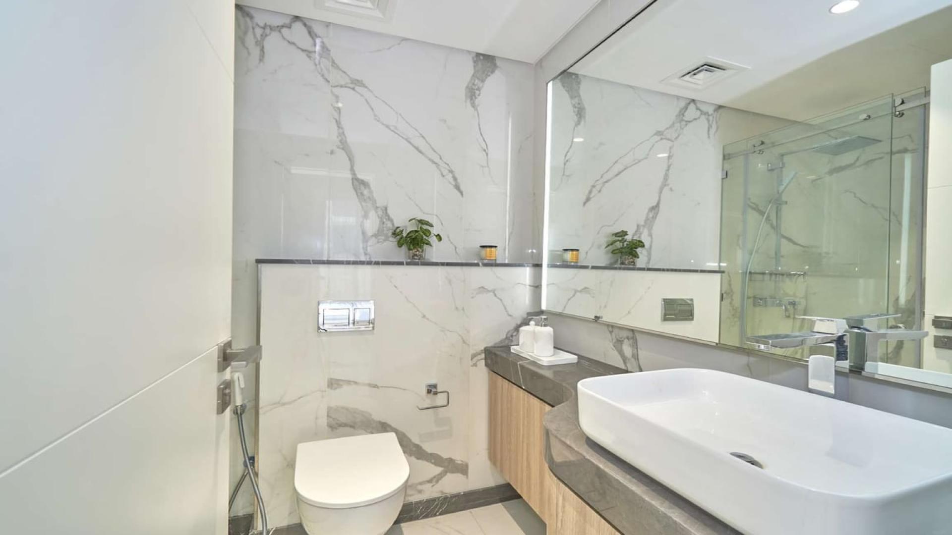 Modern bathroom in studio apartment, Pinnacle Tower, Dubai Hills Estate, marble finishes