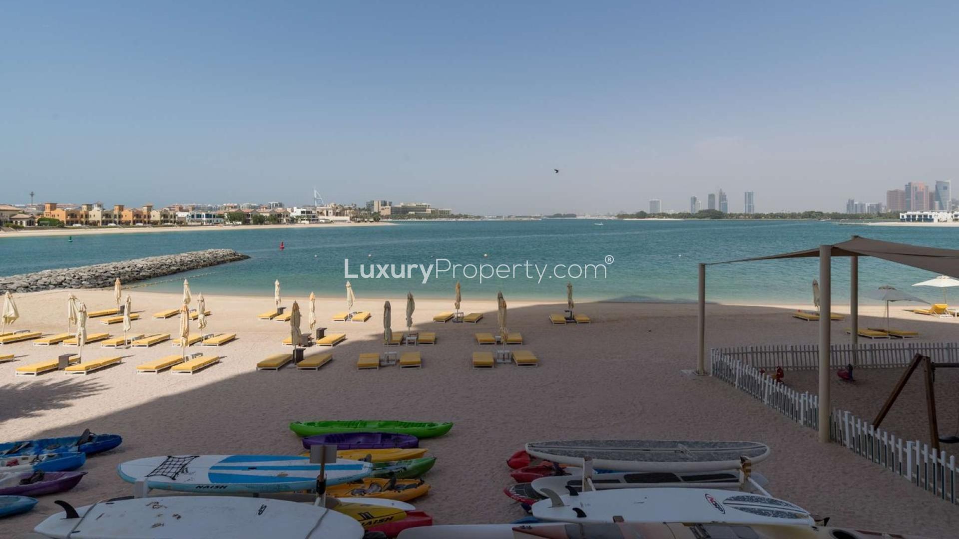 Luxury beachfront apartment living room with marina view in Tiara Residences, Palm Jumeirah