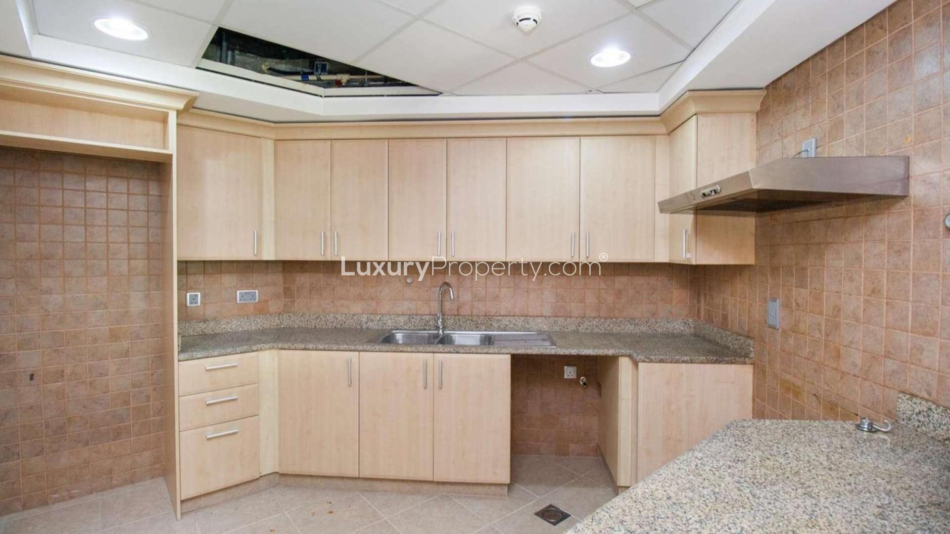 High floor apartment hallway with arched entry, wooden doors in Palm Jumeirah, Dubai