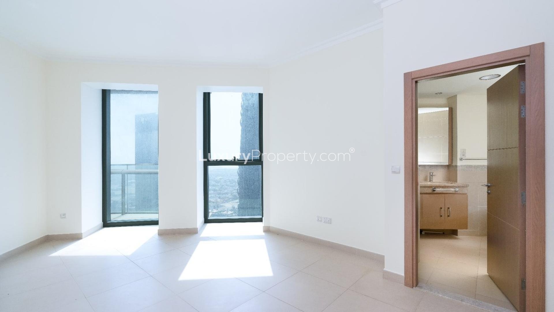 Unfurnished living room in two-bedroom apartment, Burj Vista, Downtown Dubai, for sale