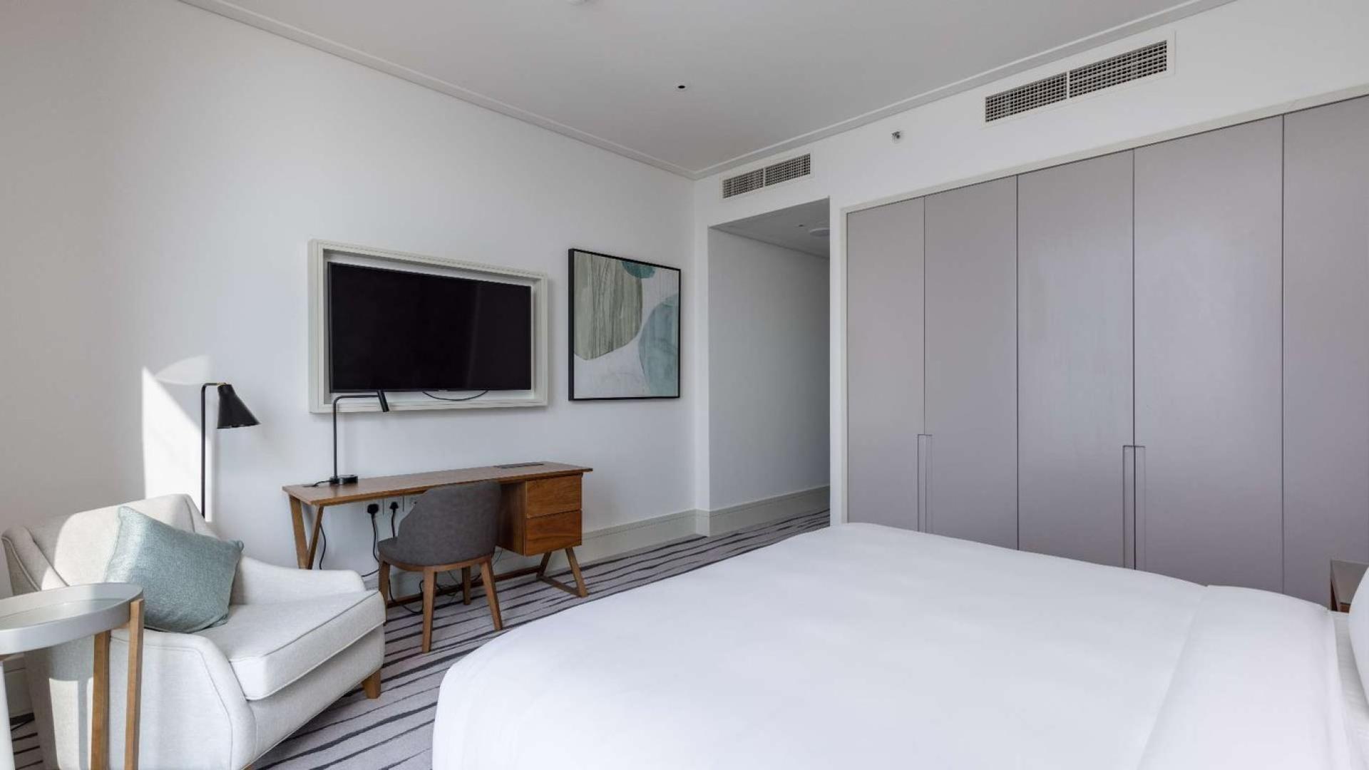 Modern living room in Vida Residences apartment, Downtown Dubai, featuring elegant decor and furnishings