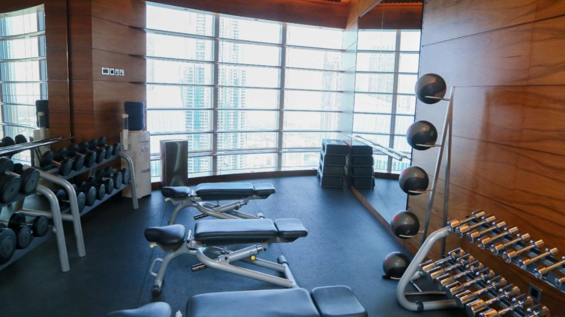 Luxurious Downtown Dubai apartment with panoramic floor-to-ceiling windows and stunning city views