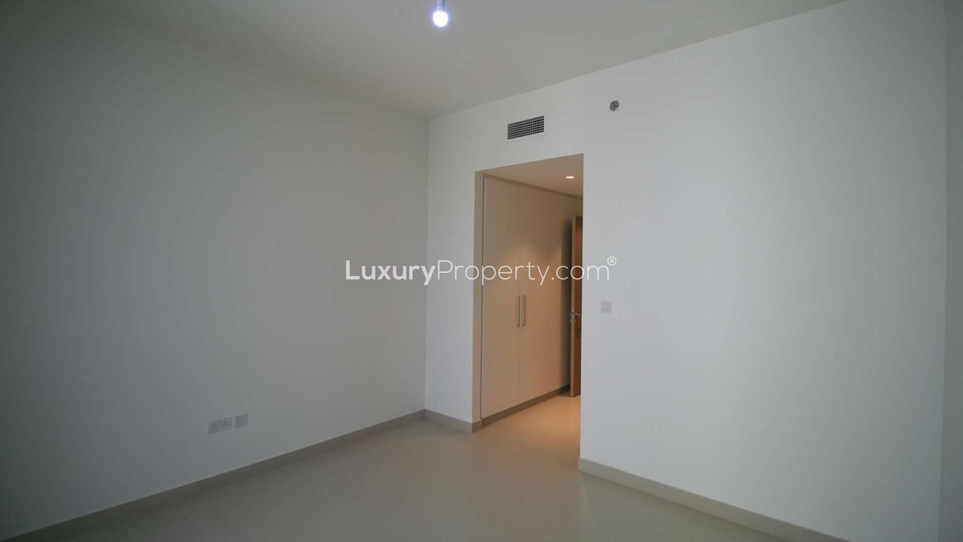 Modern apartments in Dubai Hills Estate overlooking landscaped park and recreational area