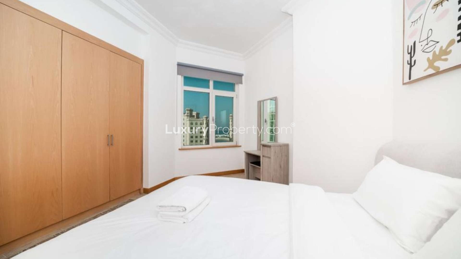 Living room of 2-bedroom E-Type Shoreline Apartment, Palm Jumeirah, with modern decor