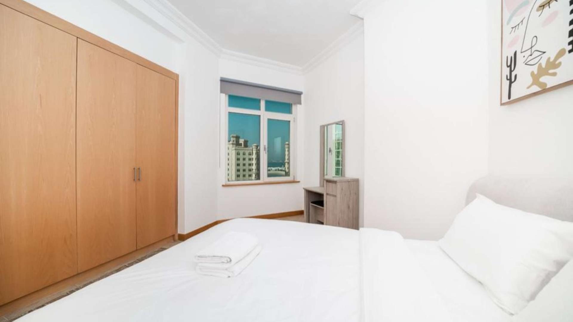 Living room of 2-bedroom E-Type Shoreline Apartment, Palm Jumeirah, with modern decor