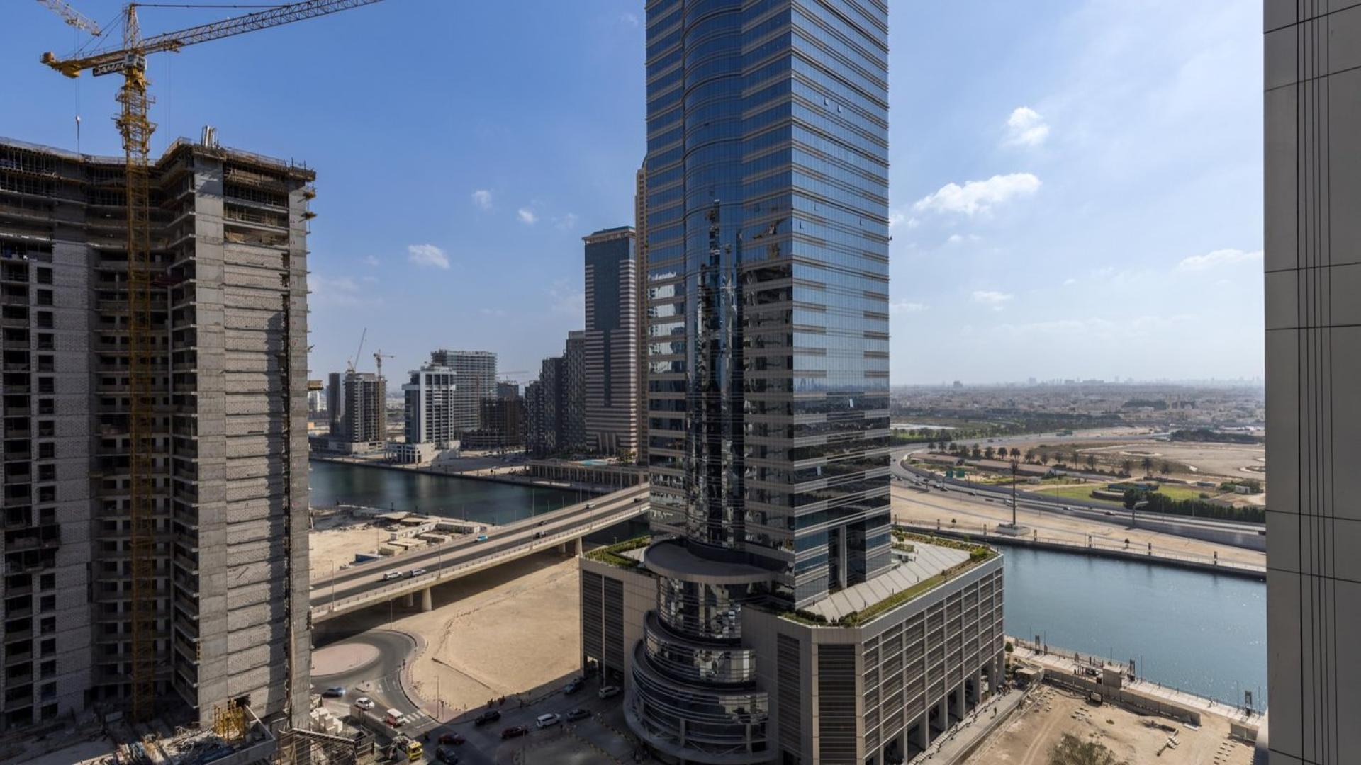 Furnished living room in Merano Tower apartment with city view, Business Bay, Dubai