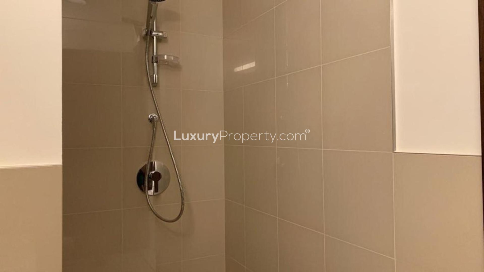 Spacious living area in Downtown Dubai apartment, Boulevard Point, with modern finishes and open layout