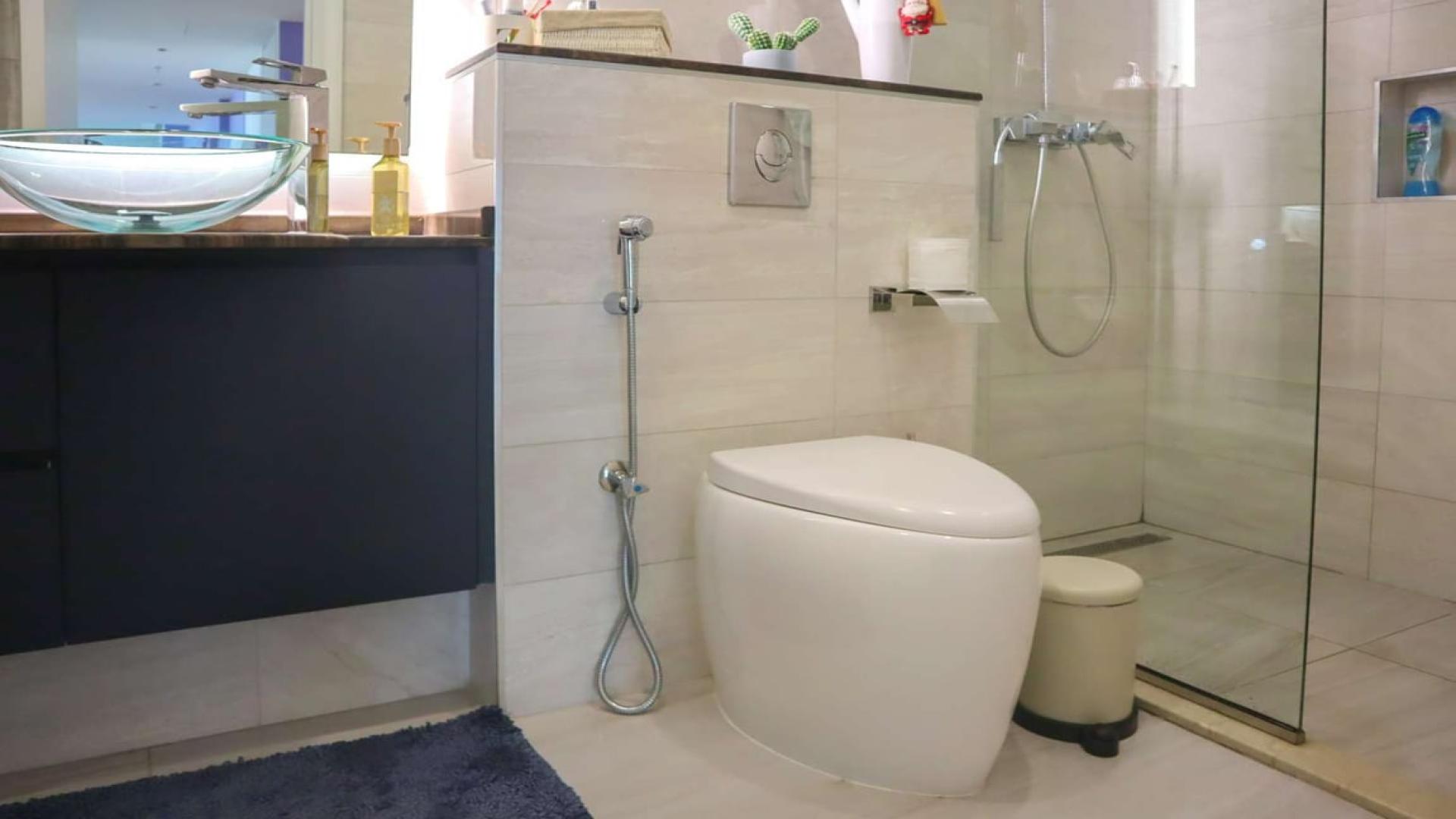 Modern living area in upgraded two-bedroom apartment, Emaar 6 Towers, Dubai Marina