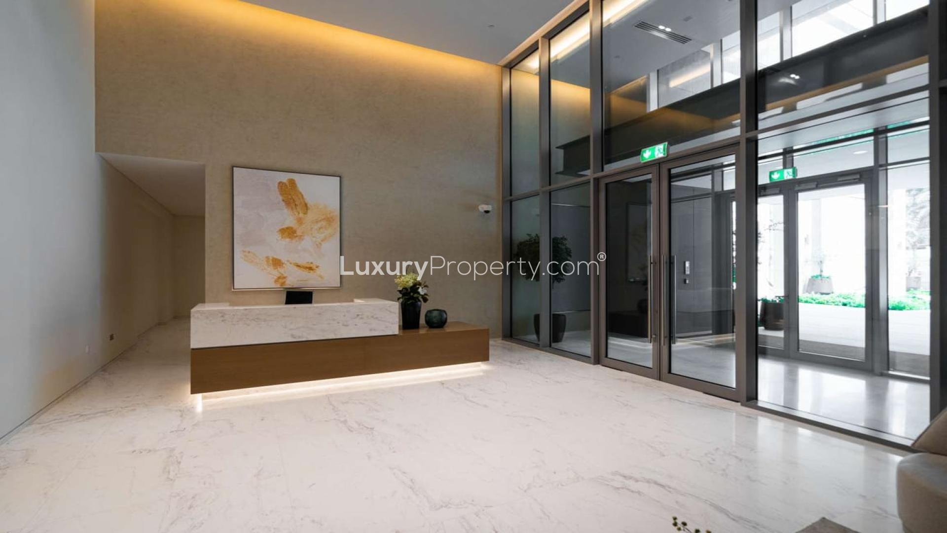 Modern living room with large windows in Downtown Dubai apartment for rent