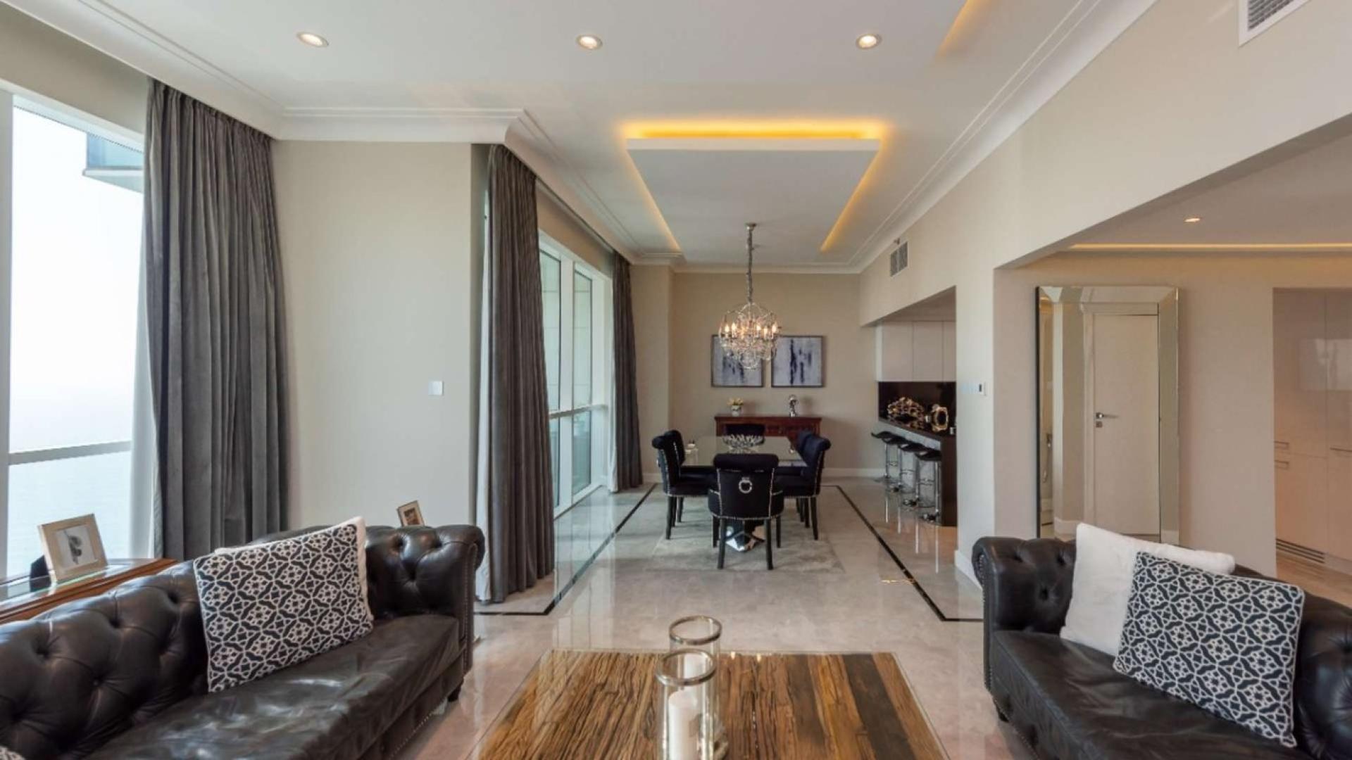 Luxurious living room in fully renovated beachfront apartment, Jumeirah Beach Residence, Al Bateen Residences