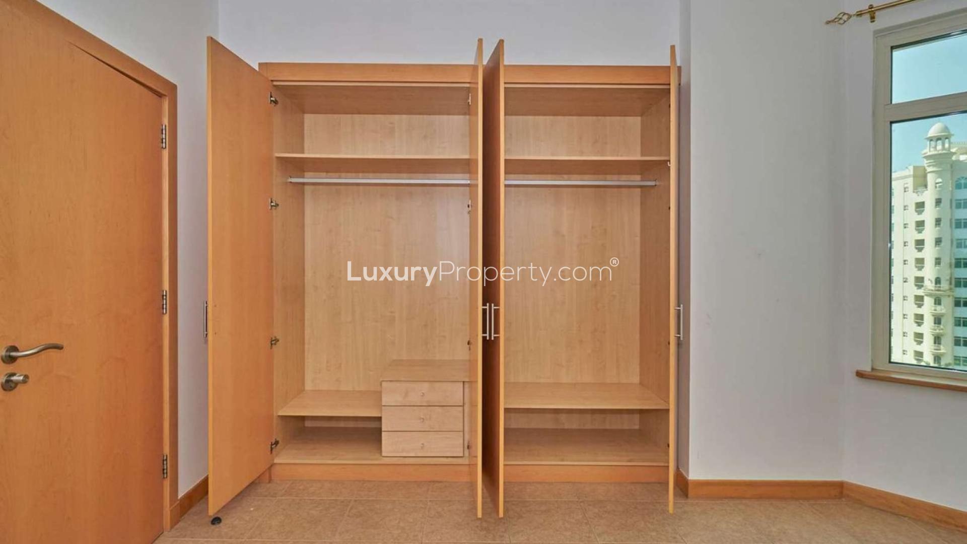 Mid-floor apartment interior with balcony view in Shoreline Apartments, Palm Jumeirah