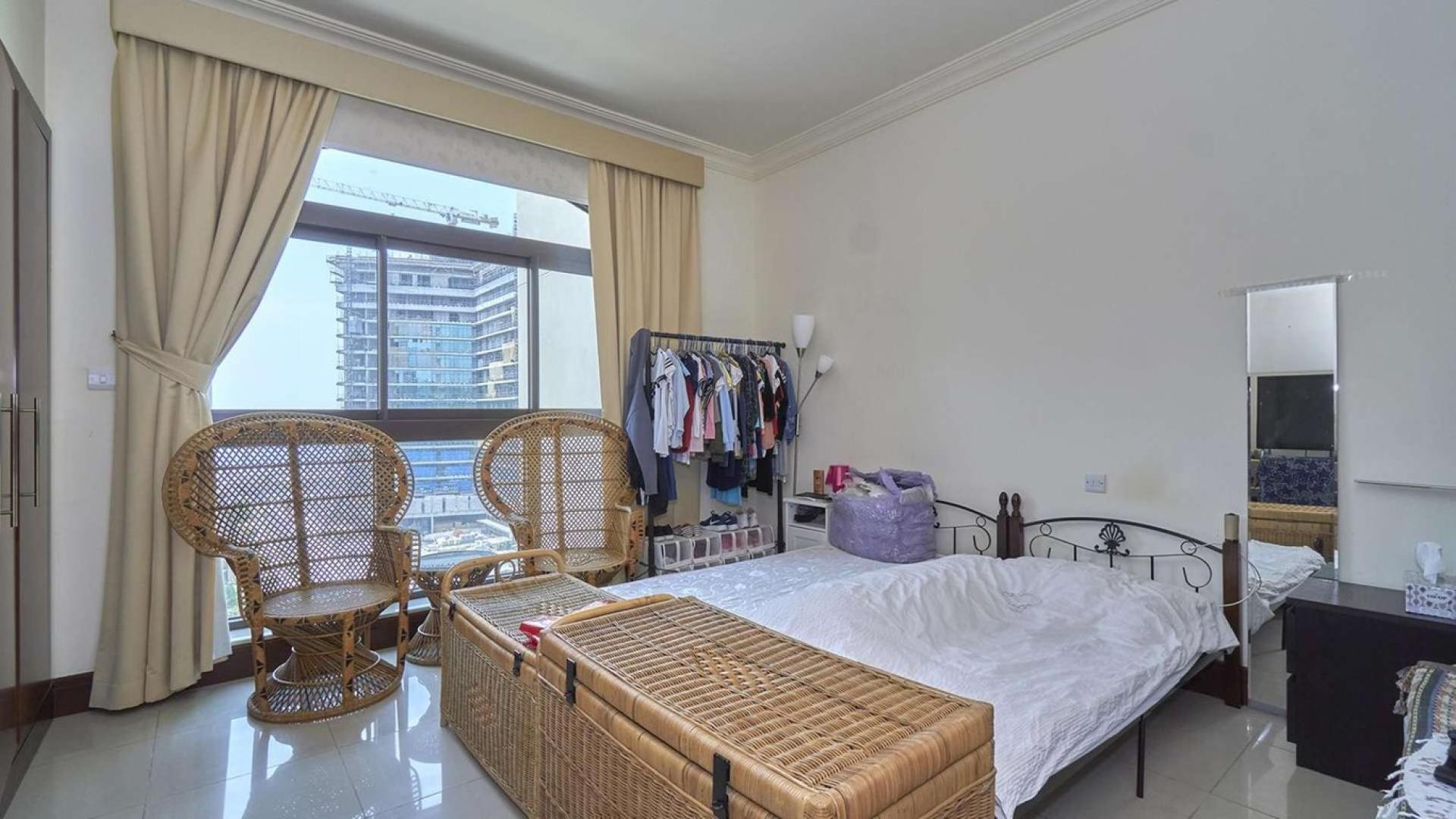 High floor living room in Palm Jumeirah apartment, featuring modern decor and large windows