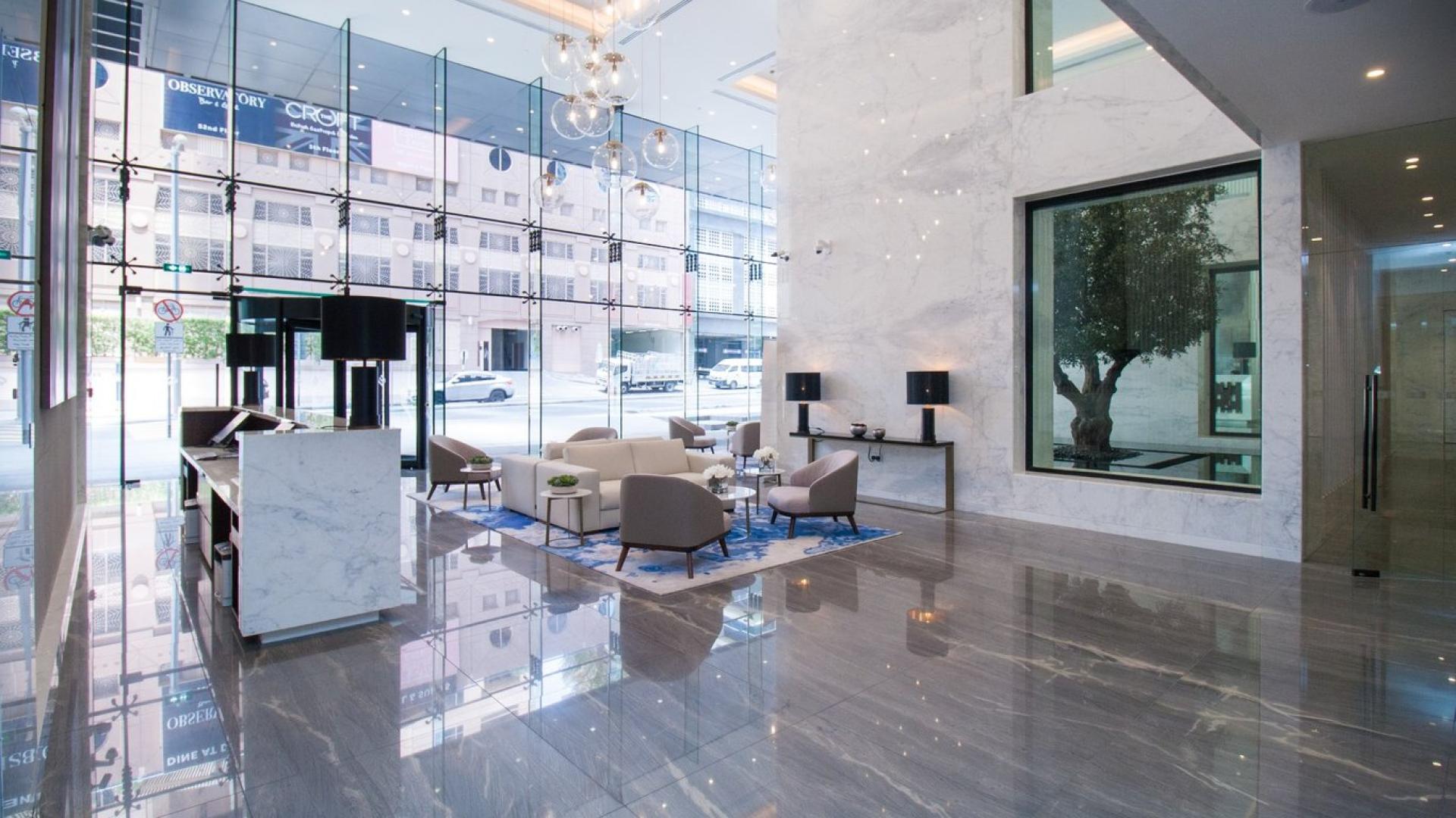 Upgraded kitchen and dining area in Jumeirah Living Marina Gate apartment, Dubai Marina