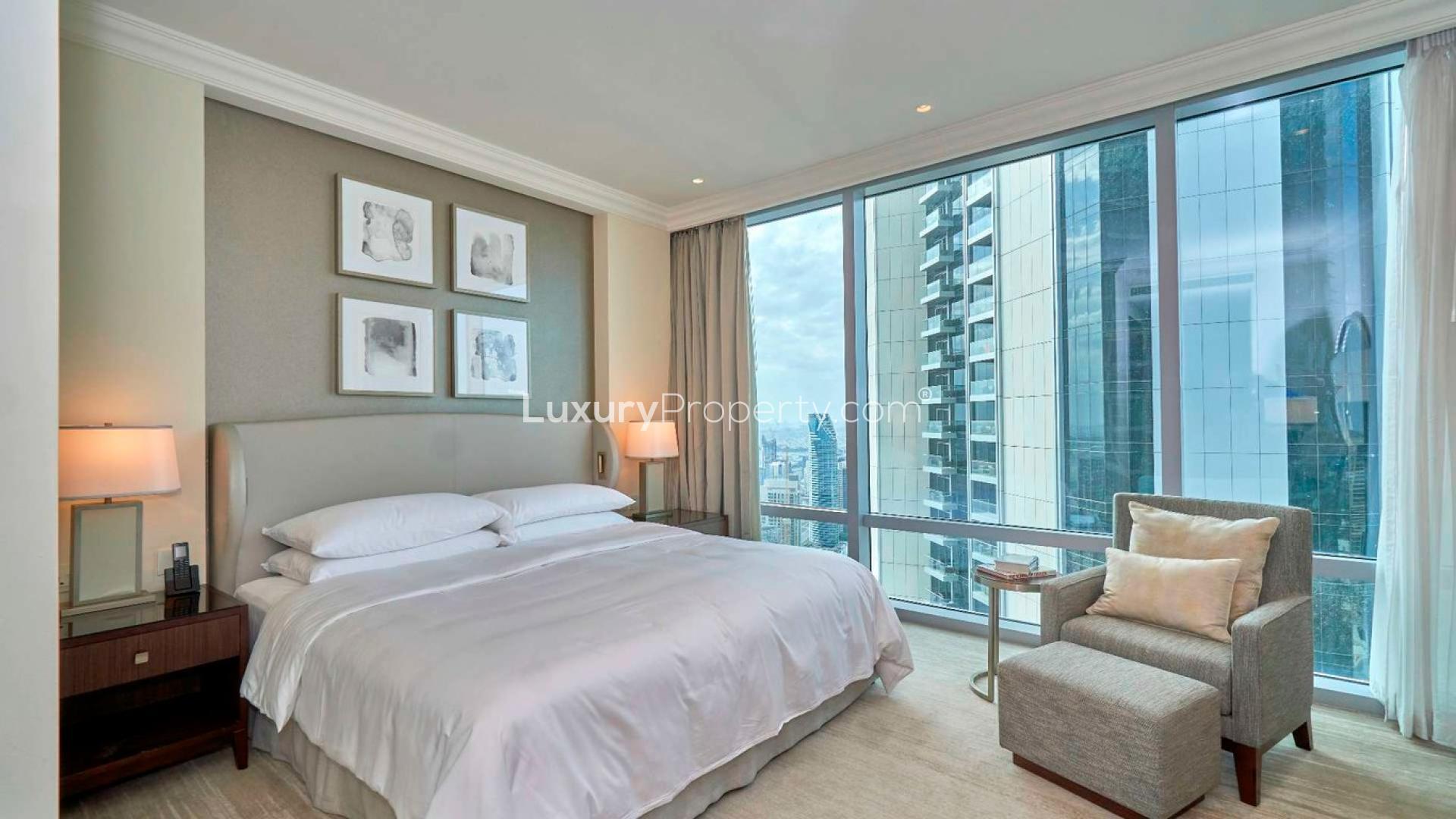 Luxury apartment dining and living area with Burj Khalifa views, Downtown Dubai