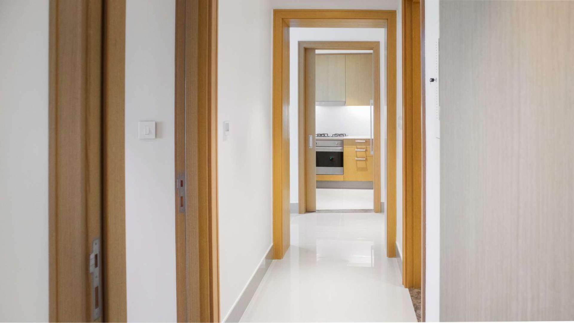 Modern hallway and kitchen in Downtown Dubai apartment, Burj Khalifa Area, for sale