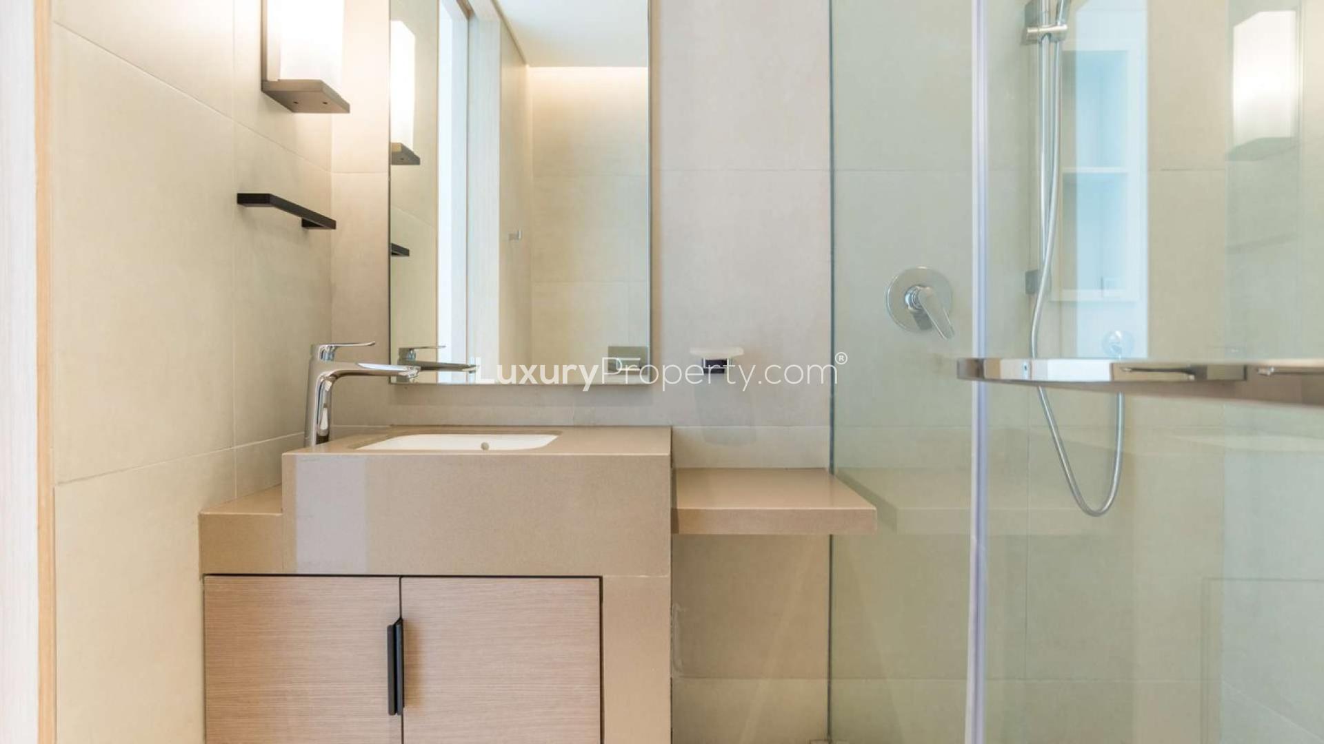 Elegant bedroom in two-bed apartment, The Address Jumeirah, with stunning city views