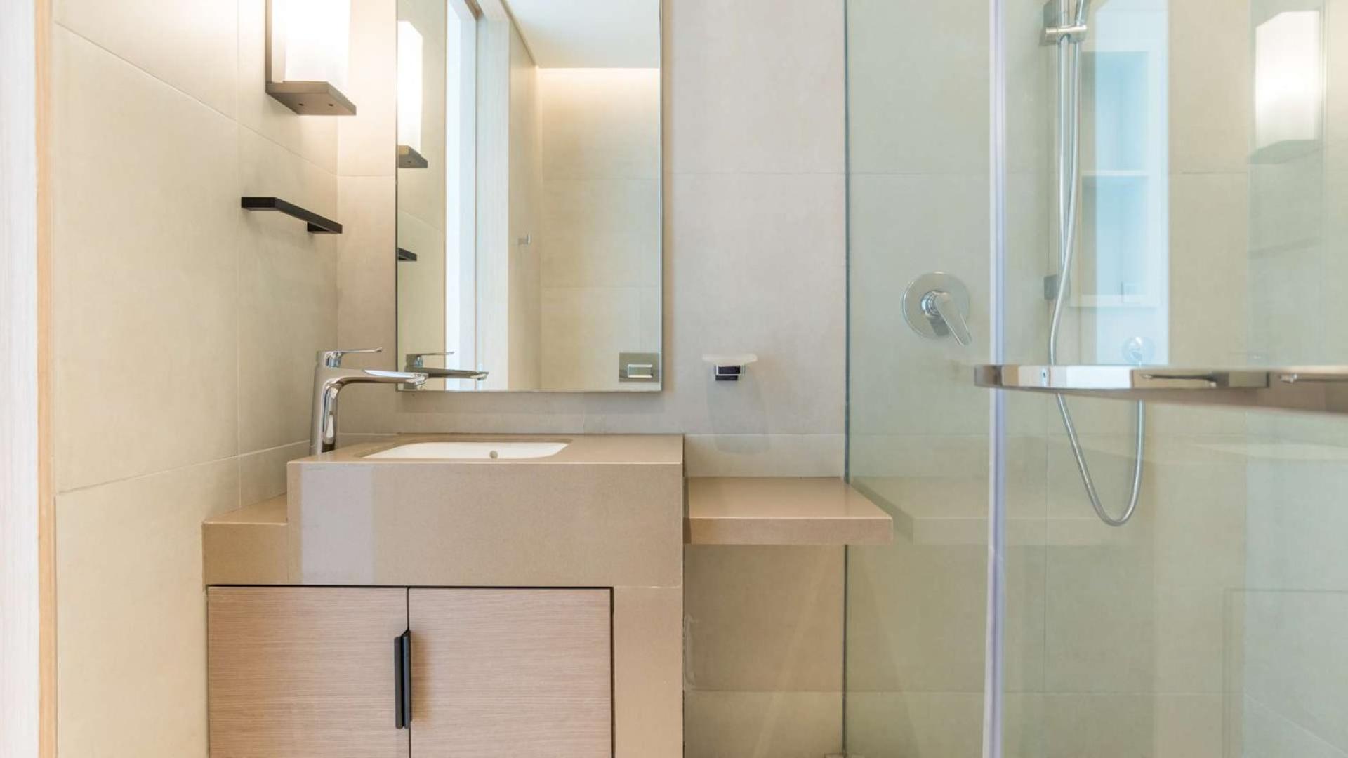 Elegant bedroom in two-bed apartment, The Address Jumeirah, with stunning city views