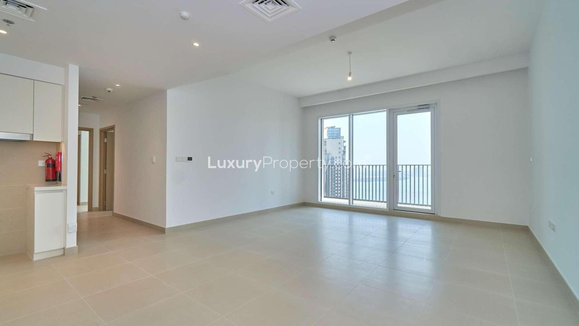 Aerial view of Creek Horizon towers overlooking Dubai Creek Harbour waterfront and cityscape