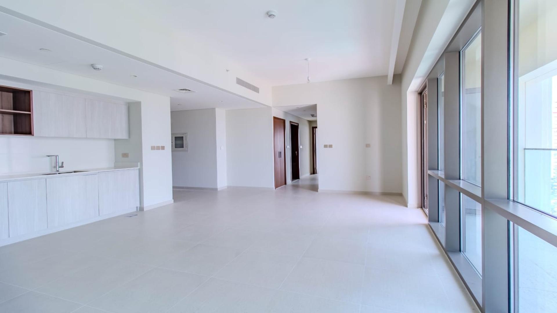 Modern kitchen and living area in luxury apartment, Dubai Creek Harbour, Creek Beach