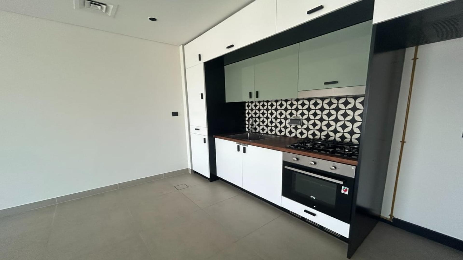 Mid-floor corner apartment with pool view in Dubai Hills Estate, bright living space