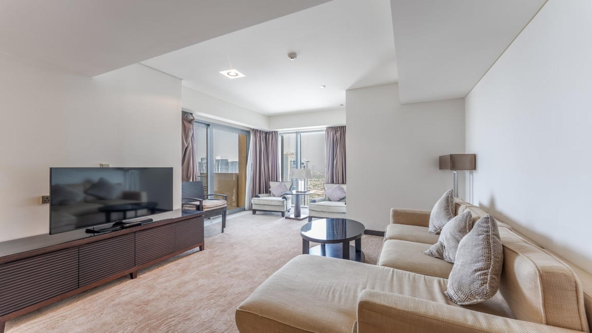 Furnished living and dining area in 2-bedroom apartment, JW Marriott Marina, Dubai