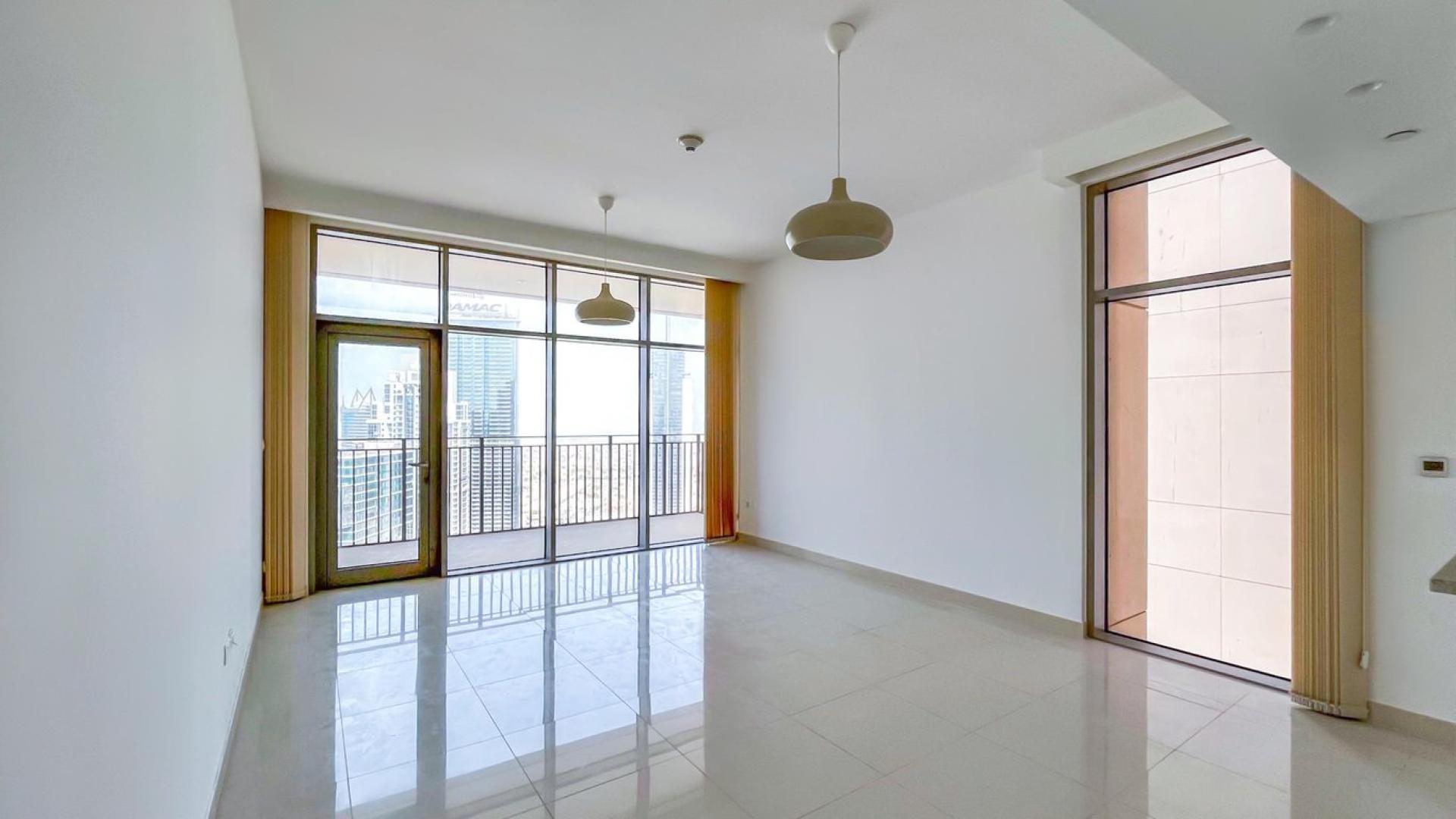 Empty living room in high-floor apartment, BLVD Crescent, Downtown Dubai, tiled floors, modern lights
