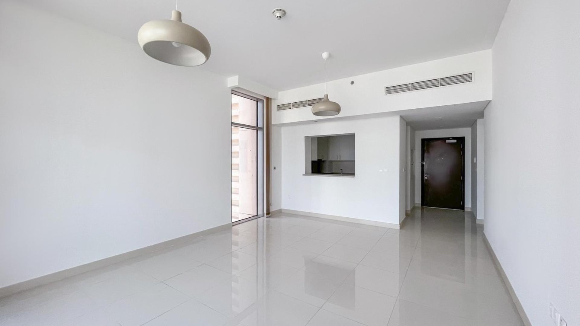 High-floor apartment living room with large windows, BLVD Crescent, Downtown Dubai