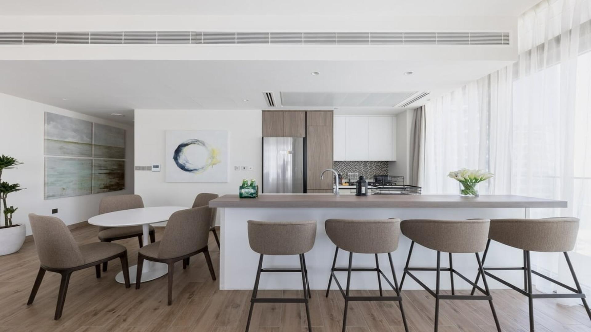 Modern kitchen and dining area in furnished Dubai Marina apartment, Marina Gate, LP40828