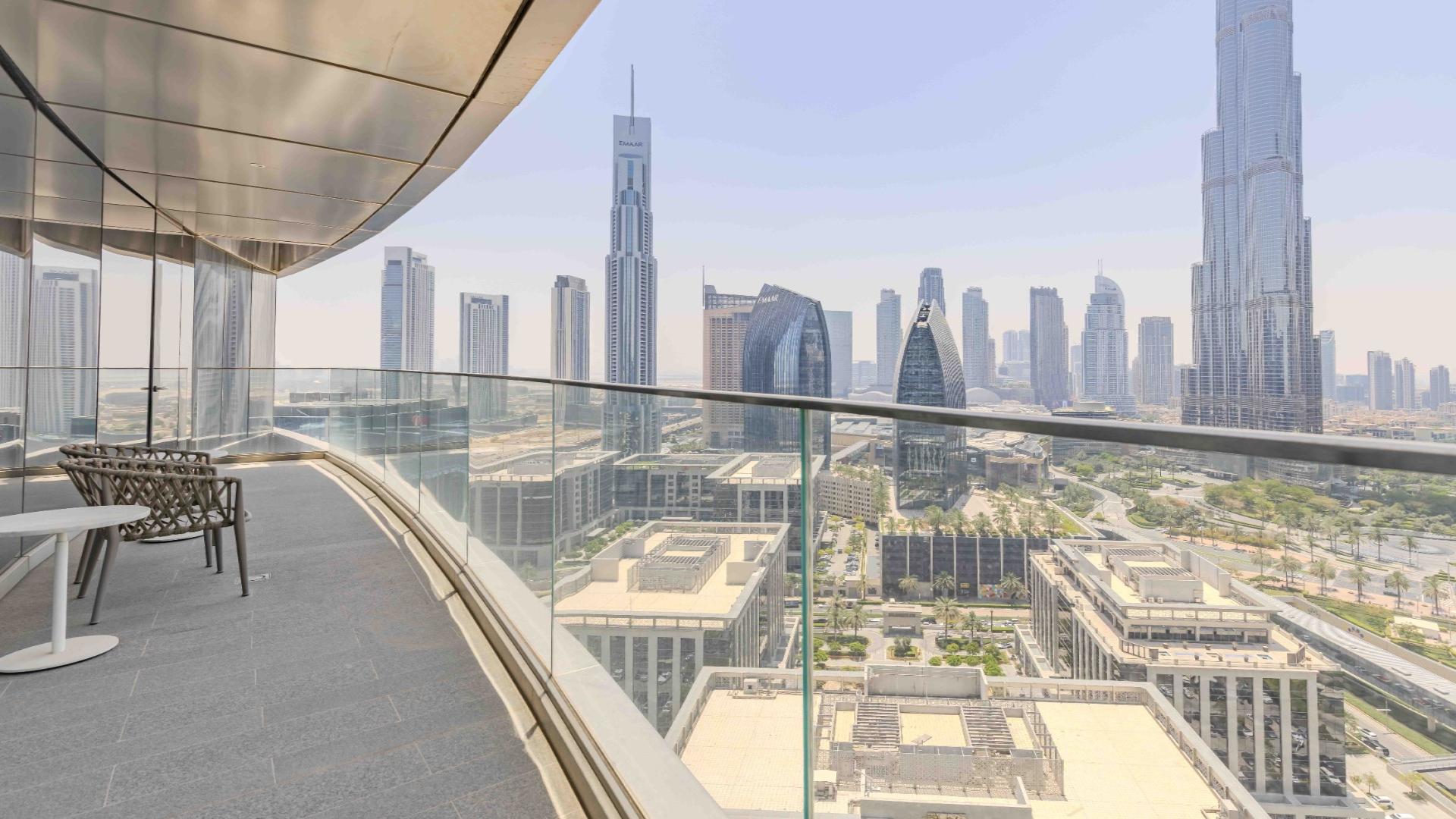 Furnished living room in Sky View apartment, Downtown Dubai, with city skyline view