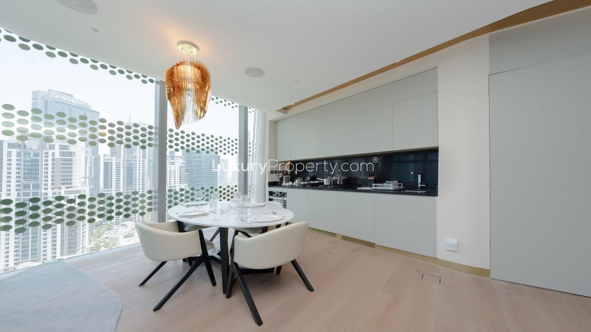 Furnished living and dining area in Zaha Hadid-designed apartment, The Opus, Business Bay
