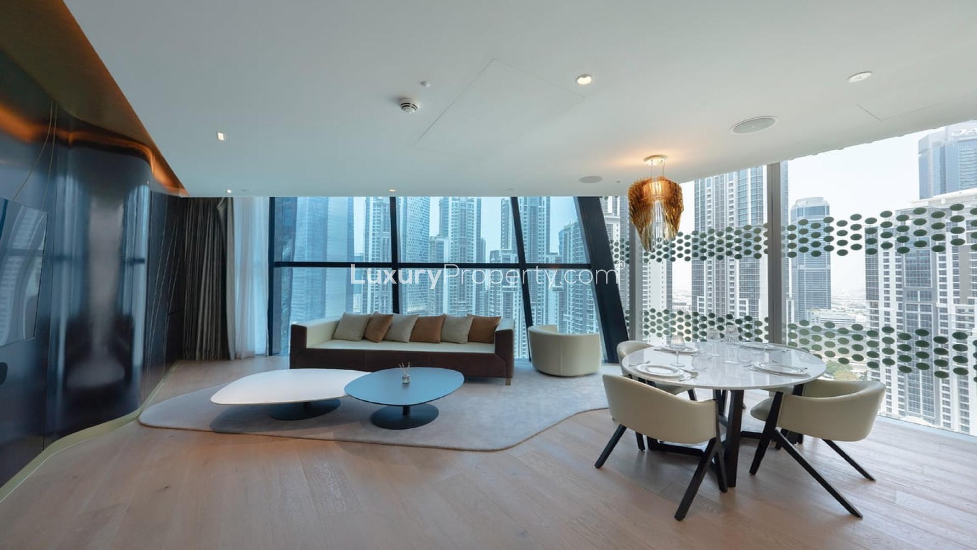 Contemporary furnished apartment interior with city view in The Opus, Business Bay, Dubai