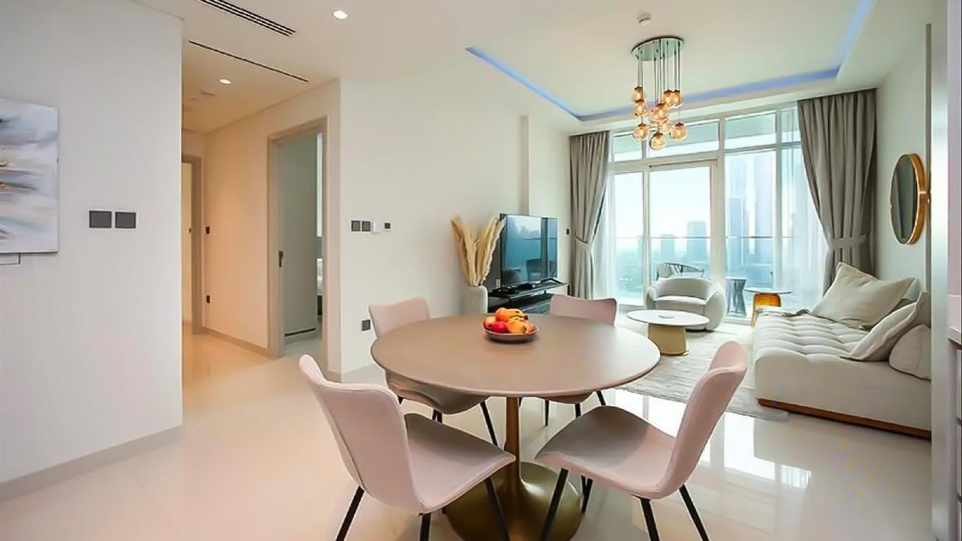 Luxurious living room in 2-bedroom apartment, Emaar Beachfront, Dubai Harbour, with modern decor