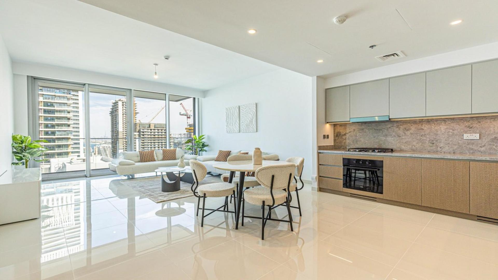 Aerial view of Emaar Beachfront luxury apartment with stunning Dubai Harbour skyline