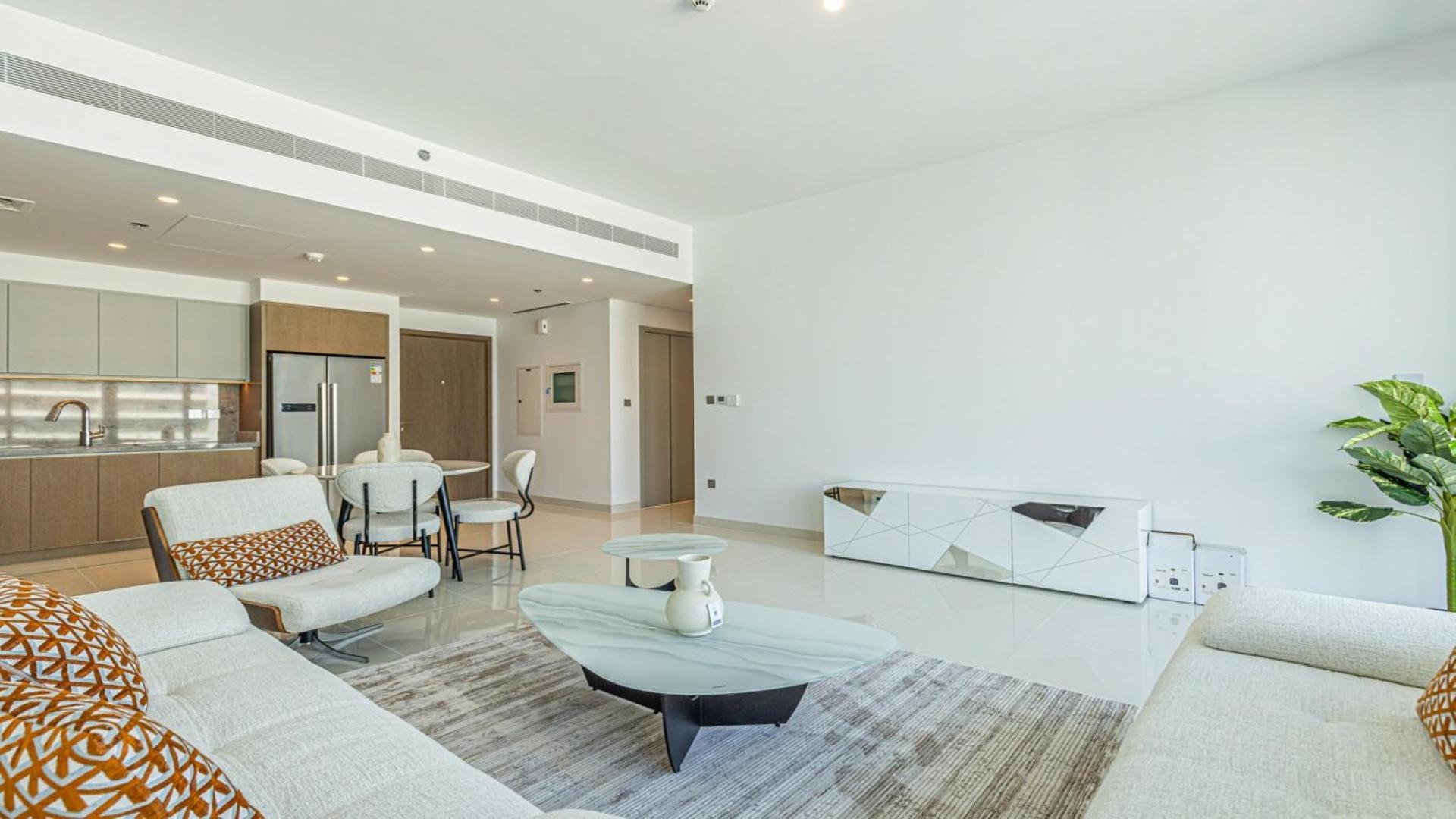 Luxurious living room with ocean view in Emaar Beachfront 2-bedroom apartment, Dubai Harbour