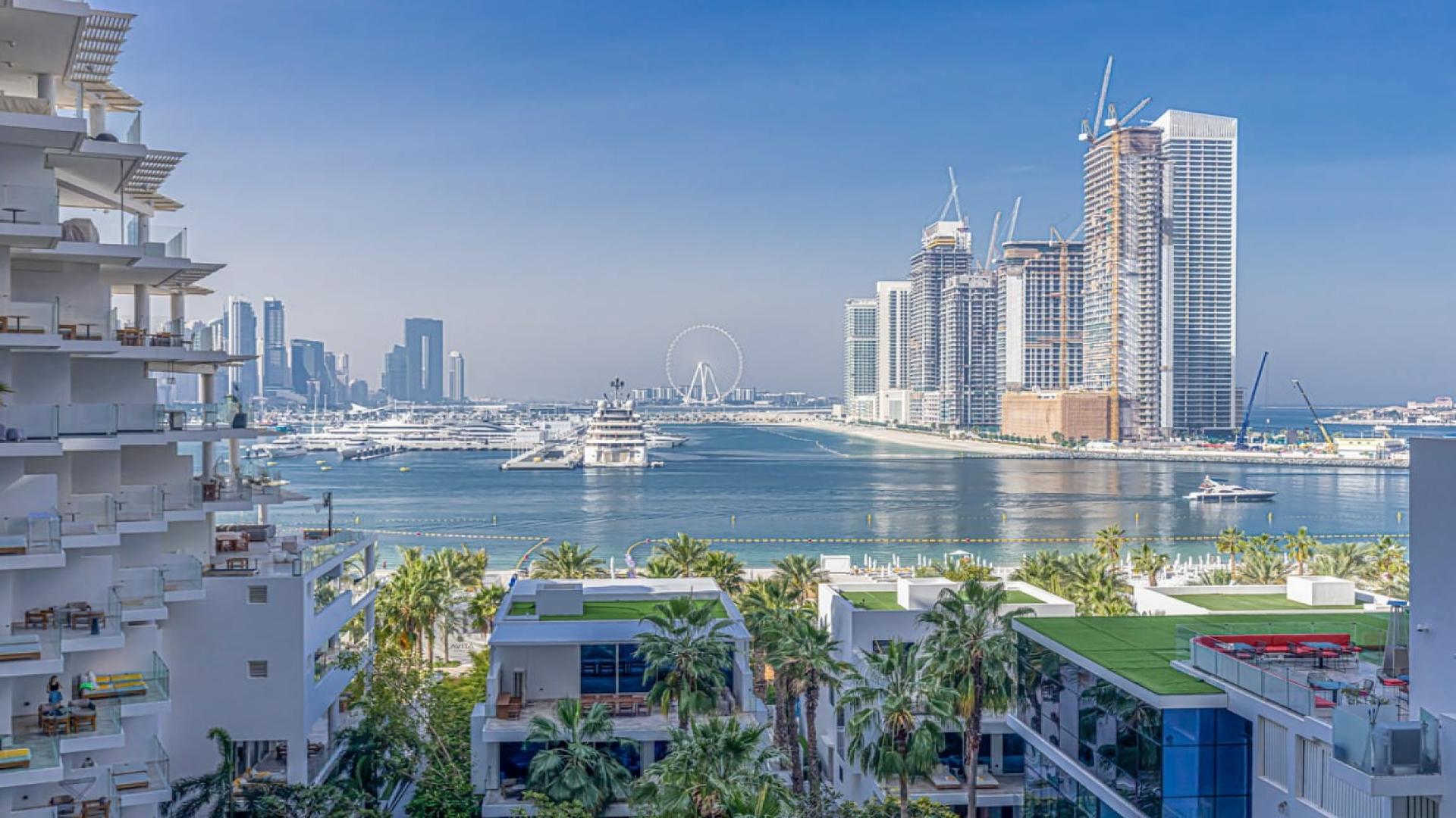 Luxury Palm Jumeirah apartment living room with modern decor and sea views