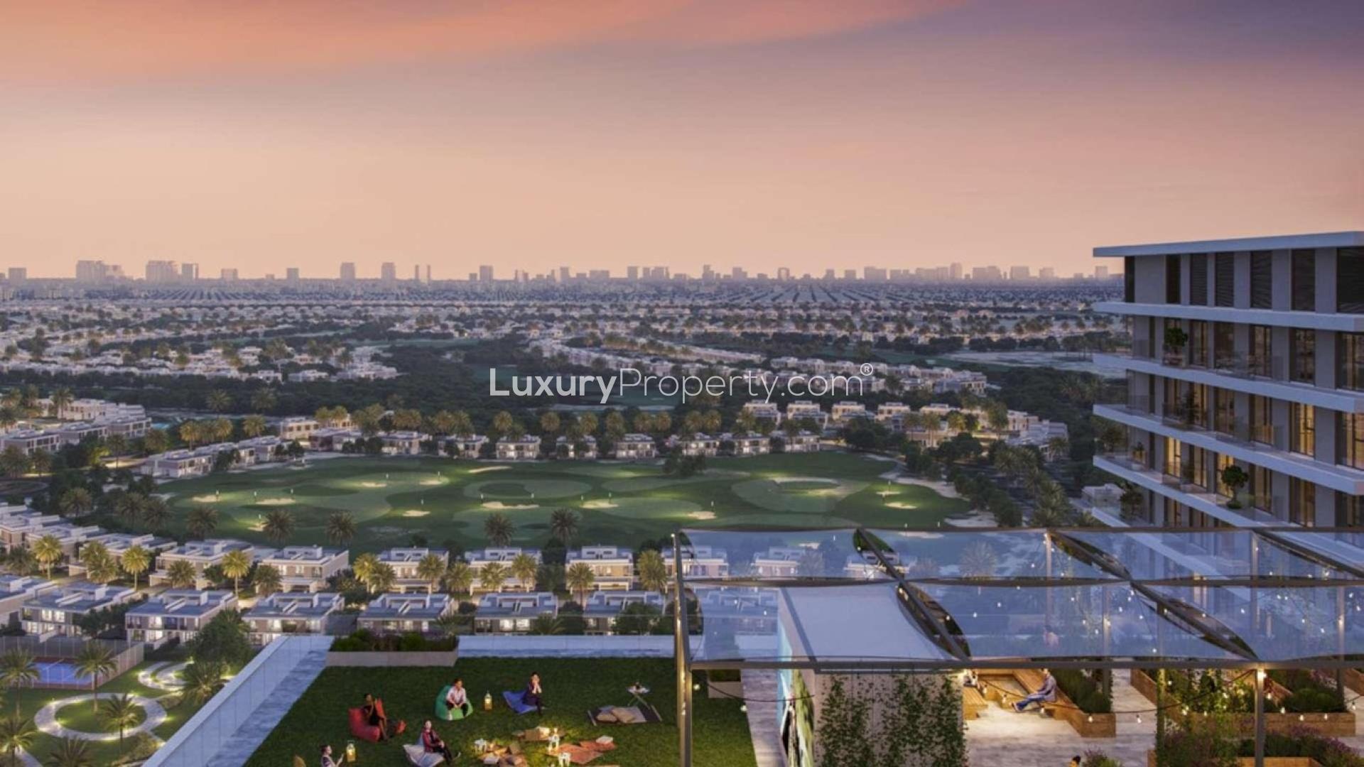 Modern apartment towers with palm trees in Dubai Hills Estate, Greenside Residence