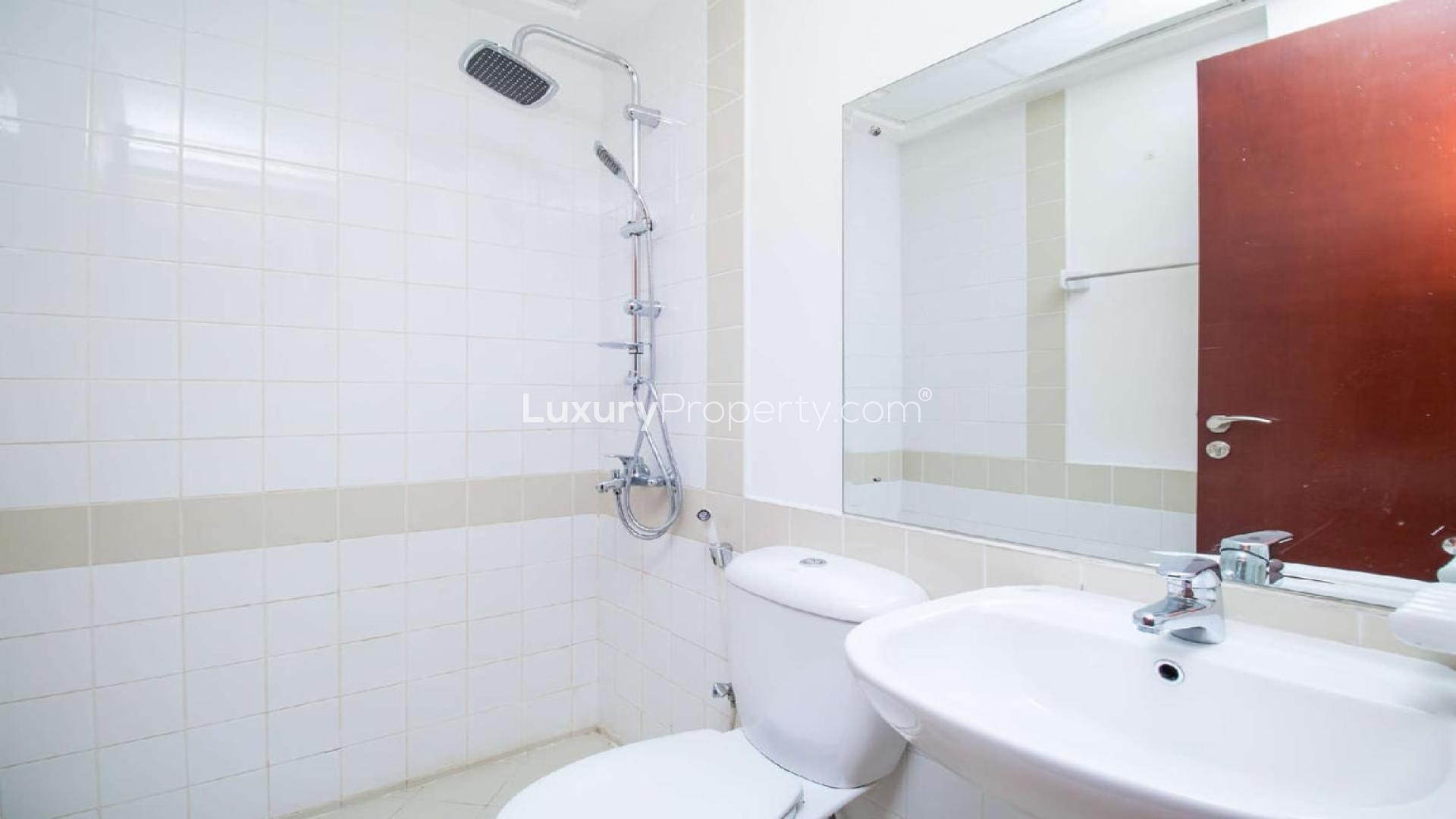 Front view of 2-bedroom townhouse for rent in Al Reem, Arabian Ranches with carport