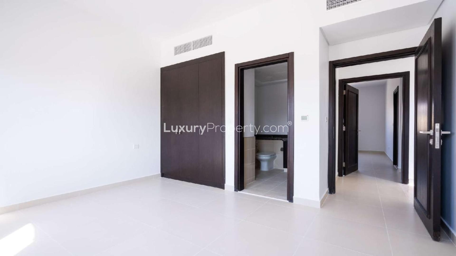 Newly built Serena Casa Dora townhouse interior with modern kitchen and staircase