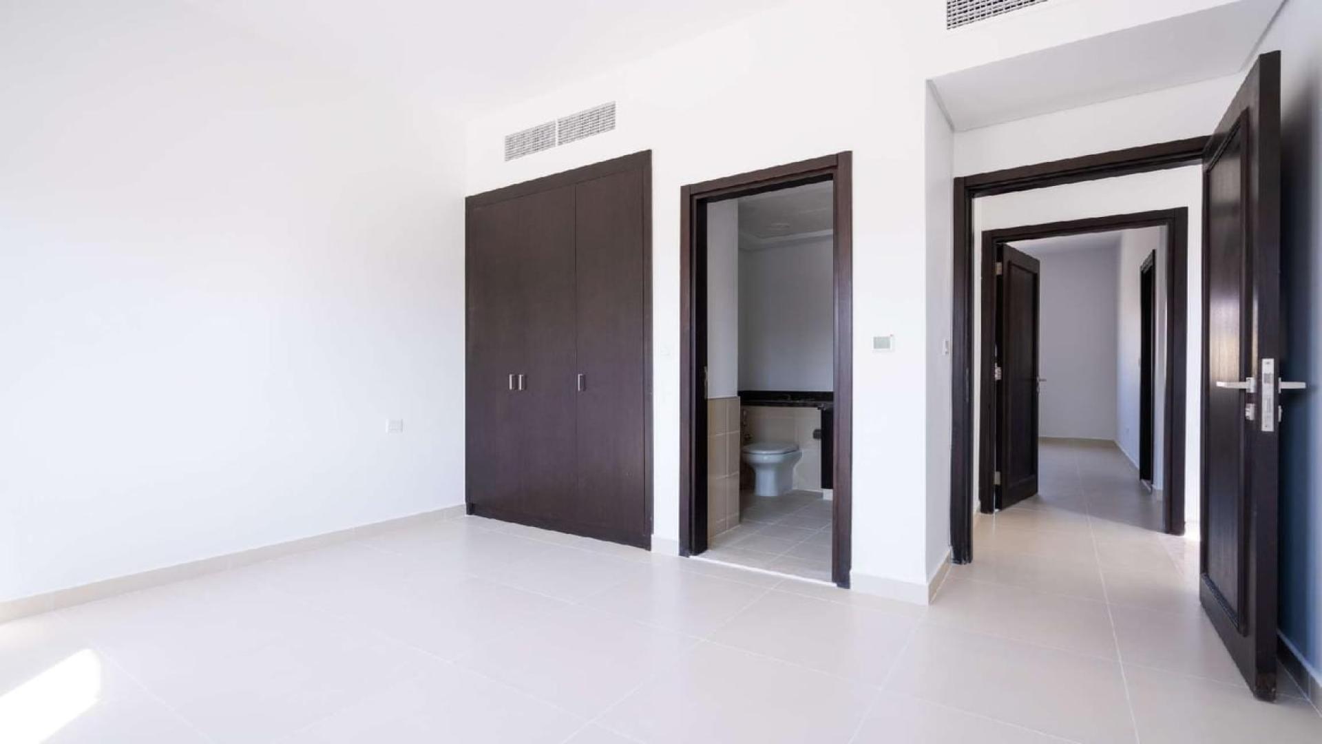 Newly built Serena Casa Dora townhouse interior with modern kitchen and staircase