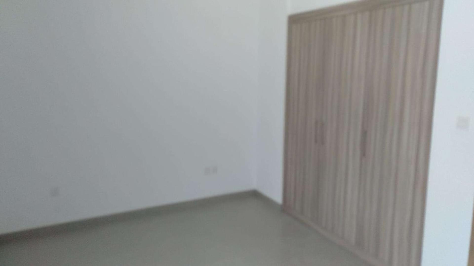 Cosy two-bedroom townhouse exterior in Arabella Townhouses, Mudon, for sale