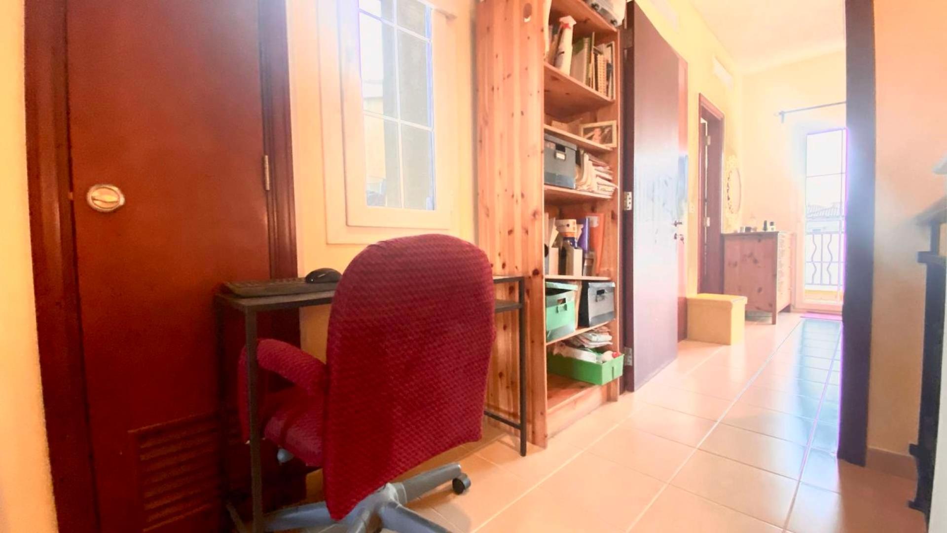 Cozy living room in Palmera townhouse, Arabian Ranches, with stylish decor and staircase view