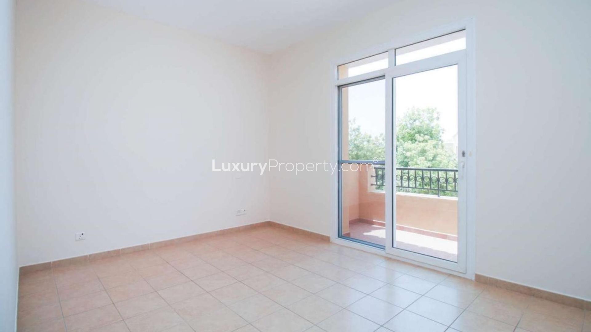 Bright living area with large windows in Palmera townhouse, Arabian Ranches, for sale