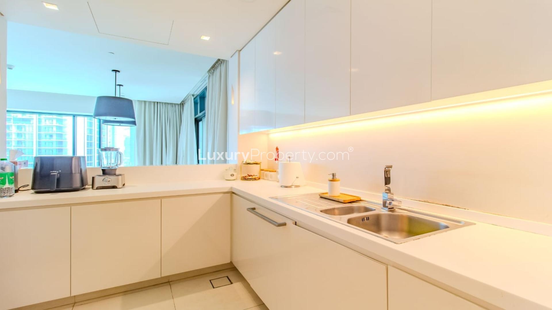 Stunning 2-bedroom apartment living area with city view in Vida Hotel, The Hills