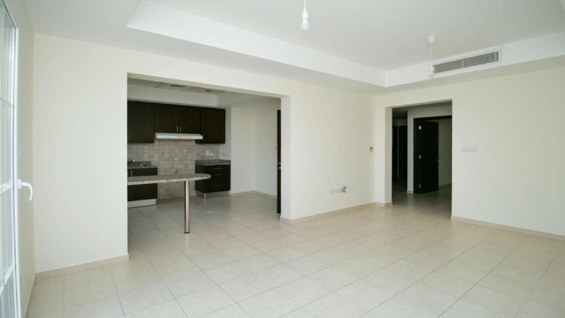 N/A,Modern kitchen and living area in 2-bedroom villa, Alma, Arabian Ranches, Dubai