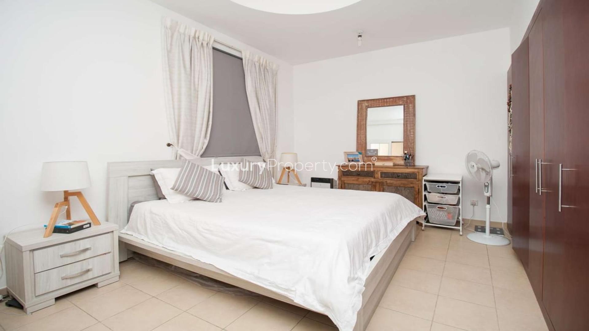 Private garden with patio and seating in Al Reem 2 villa, Arabian Ranches