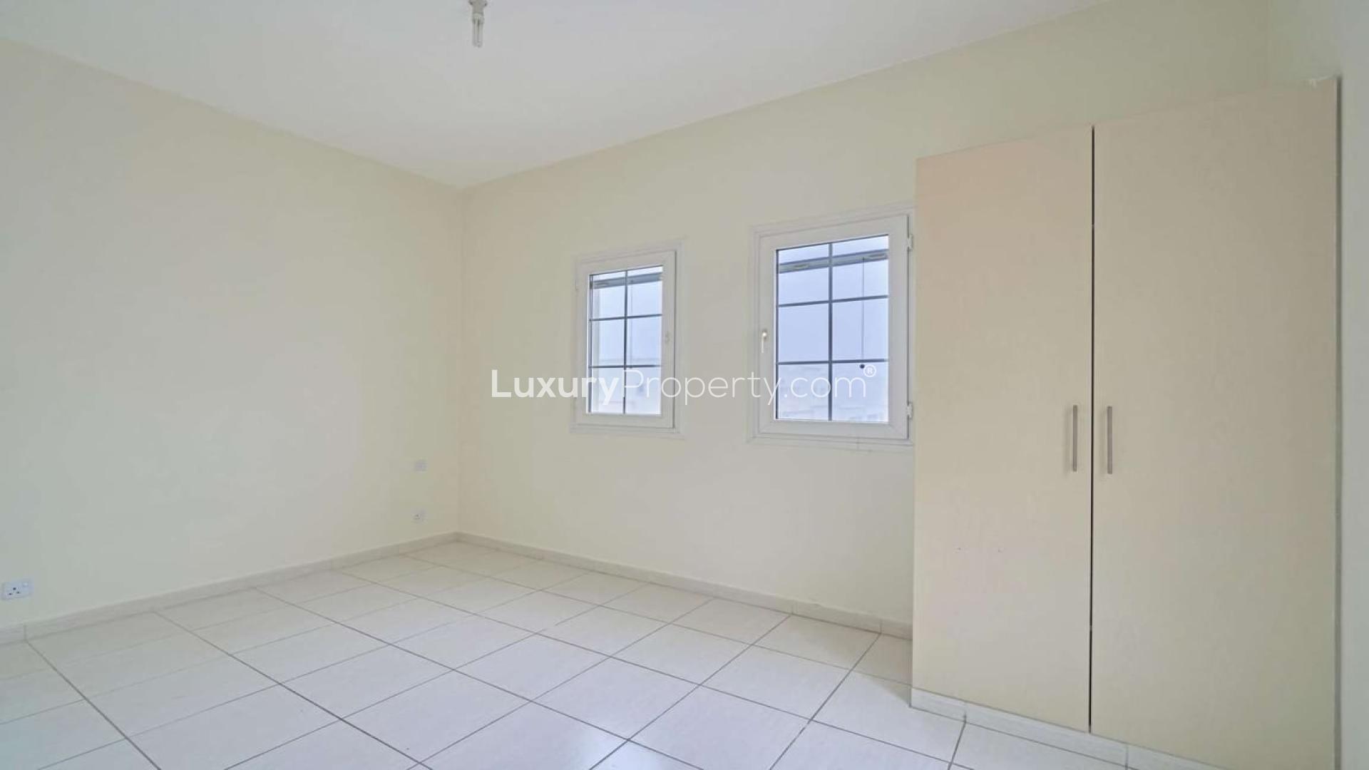 Empty bedroom with tiled floor and built-in wardrobe in Springs 14 townhouse for rent