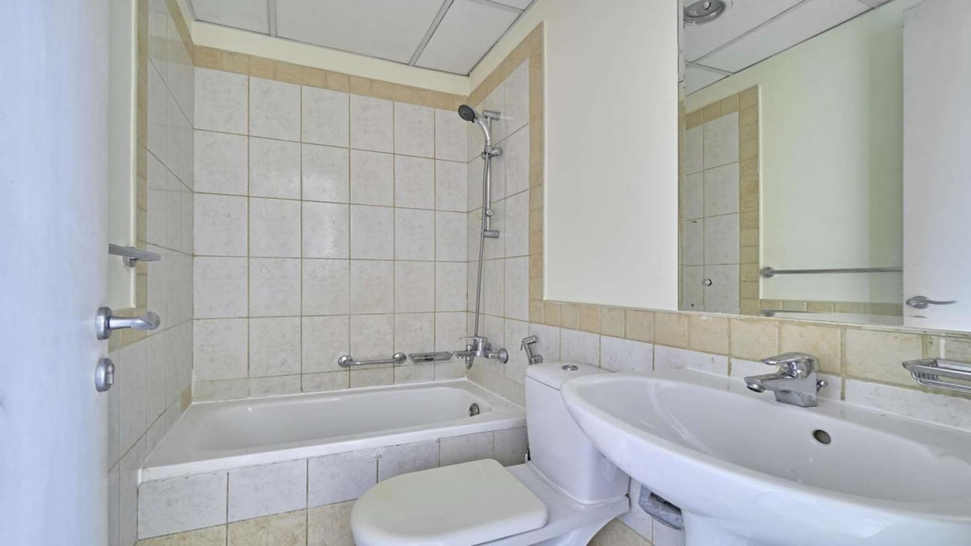 Bright empty room with tiled floor and garden view in Springs 7 villa for rent