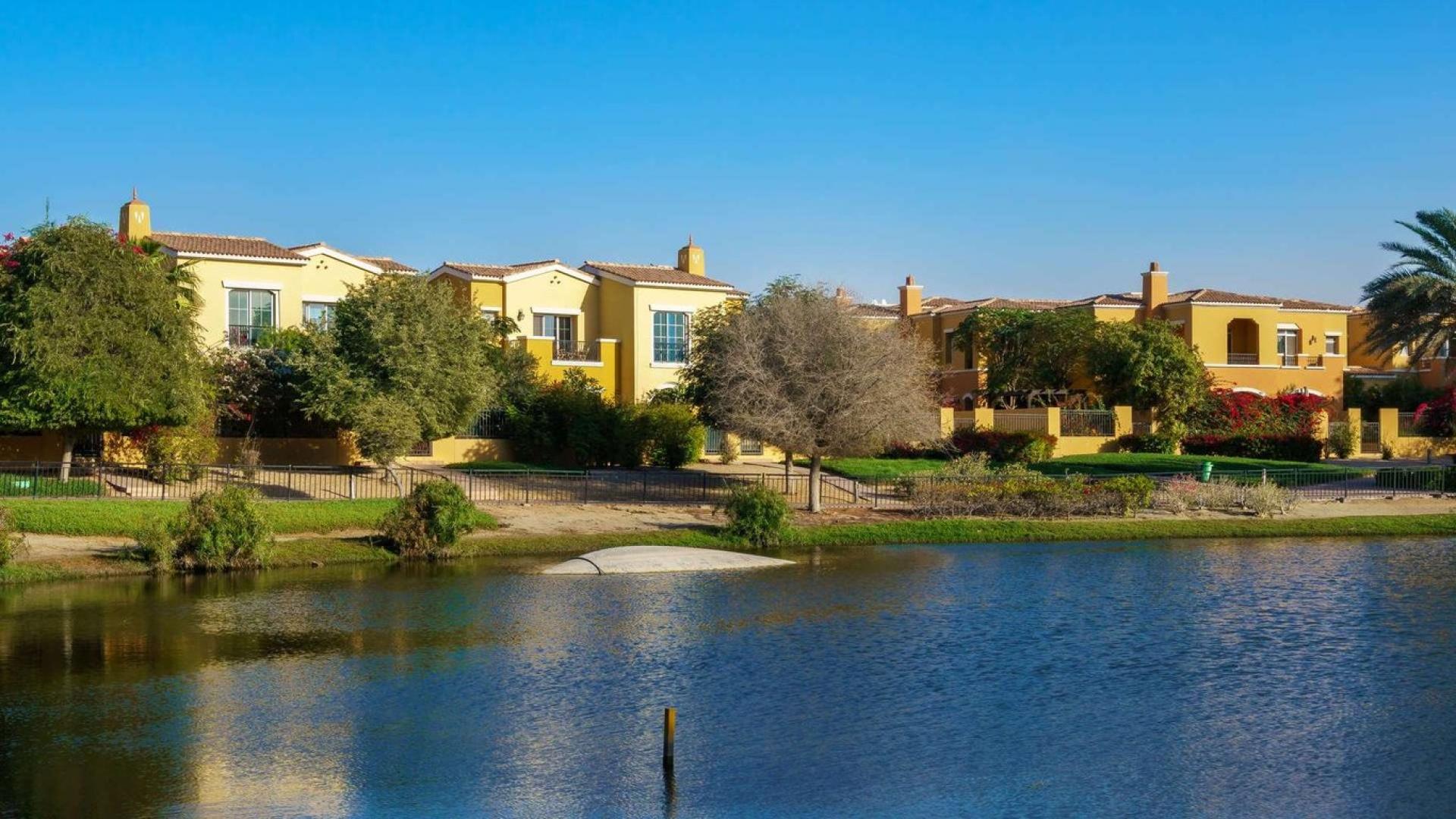 Beautiful 2-bedroom villa exterior with garden in Palmera, Arabian Ranches, for rent