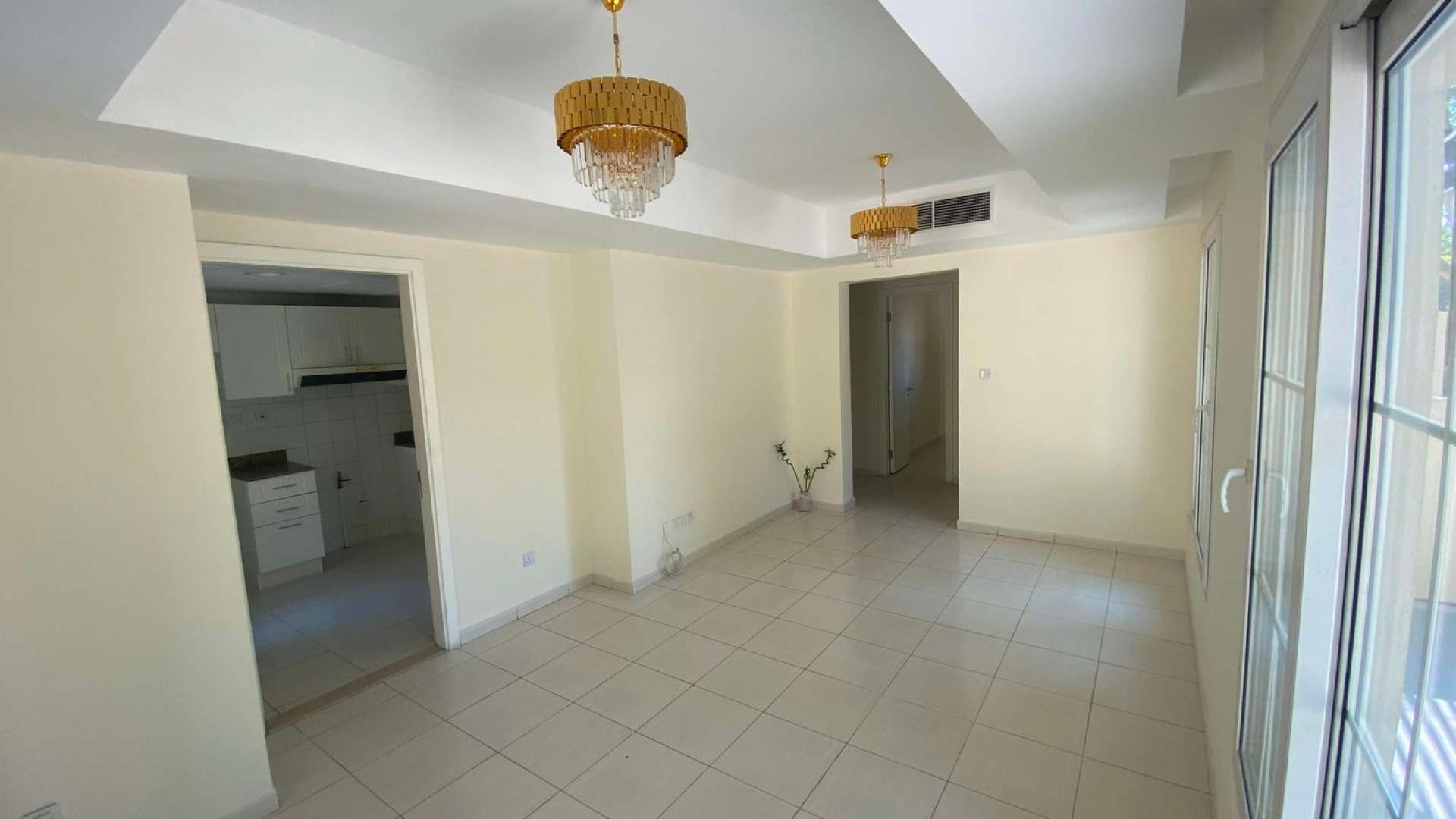 Modern 2-bedroom villa exterior with garden in Springs 3, Dubai for rent